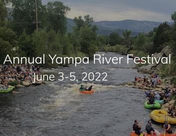 steamboat springs yampa river festival attendees in and by the water.