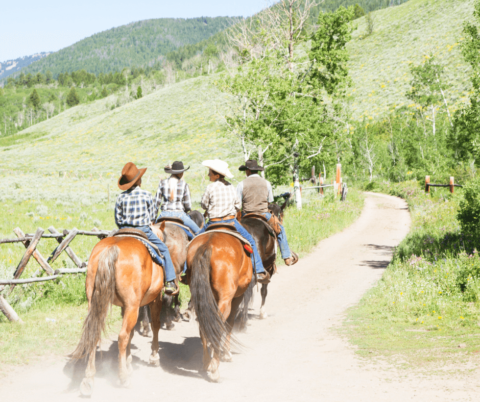Family on horseback during the Summer in Steamboat Springs, CO