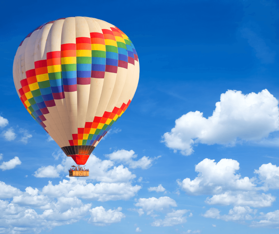 Hot Air Balloon in the sky against a pretty blue sky during the Summer in Steamboat Springs, CO